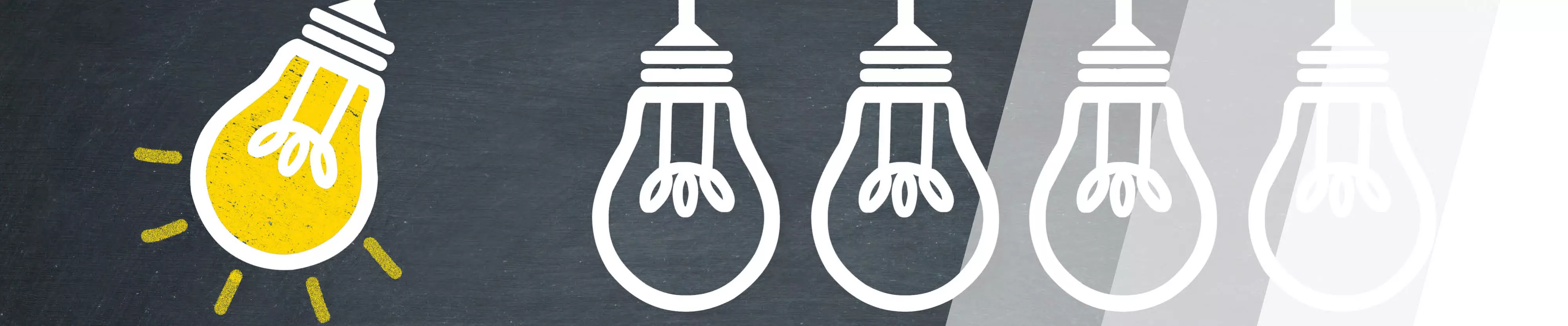 stilisierte Glühlampen, eine davon leuchtet